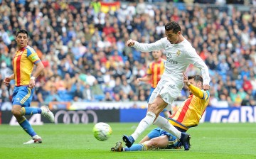 Real Madrid forward Cristiano Ronaldo against Valencia defenders.