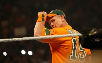 John Cena salutes the crowd at WWE SummerSlam 2015.