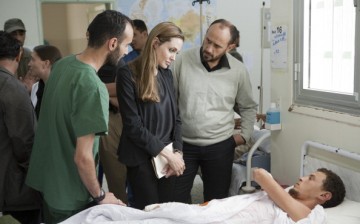 In this handout photo provided by UNHCR, actress and U.N. Goodwill Ambassador Angelina Jolie visits Libya to help agencies bringing aid to Libyans in Tripoli and Misrata on Oct. 11, 2011 in Misrata, Libya. 