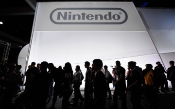 Crowds line up to view the new Nintendo game console Wii U, not the Nintendo NX