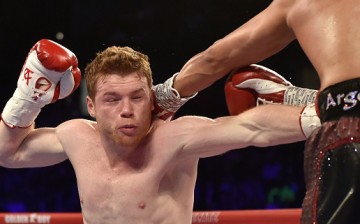 Canelo Alvarez knocks out Amir Khan during their May 7 duel at T-Mobile Arena in Las Vegas.