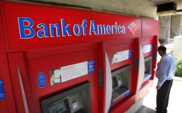 A man uses an ATM at a Bank of America branch on July 28, 2009 in Pasadena, California. 