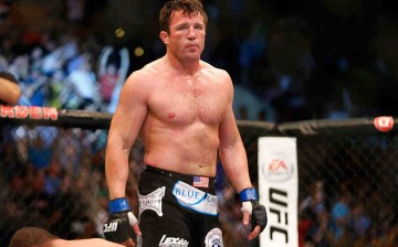 Chael Sonnen reacts after winning against Mauricio Rua via guillotine choke in their light heavyweight bout at TD Garden on August 17, 2013 in Boston, Massachusetts.