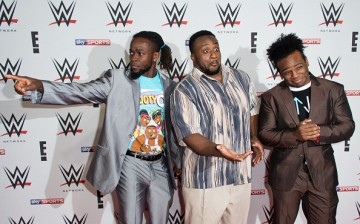 The New Day is posing at the red carpet of the 02 Brooklyn Bowl in London, England.  