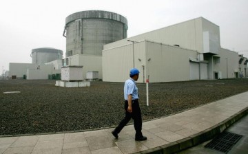 An employee walks outside the Qinshan Nuclear Power Plant in Qinshan of Hangzhou City, Zhejiang Province, China, June 10, 2005.
