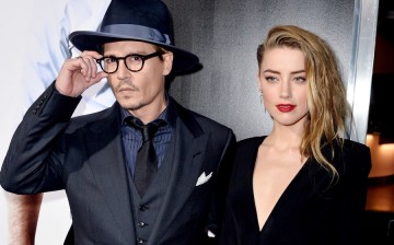 Johnny Depp and Amber Heard have ended their marriage after 15 months.
