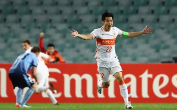 Shandong Luneng midfielder Hao Junmin celebrates scoring a goal against Sydney FC in their AFC Champions League duel.