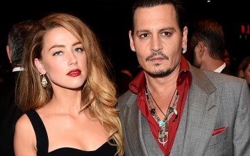 Amber Heard and Johnny Depp attend the 'Black Mass' premiere during the 2015 Toronto International Film Festival at The Elgin on September 14, 2015 in Toronto, Canada.
