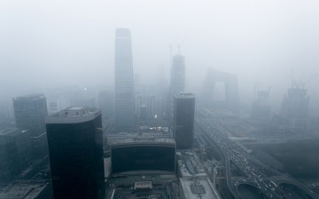 U.N. commends Beijing for its efforts to eradicate air pollution and recommends improvement of city planning for a more effective clean air drive.