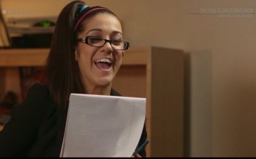 Bayley laughs during a segment of The Edge and Christian Show on the WWE Network.