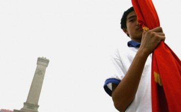 A Chinese Young Pioneer at Tiananmen Square on May 31, 2005. The Young Pioneer, a teenager organization, is guided by the Communist Youth League over the past five decades.