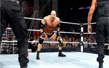 Goldberg getting ready to execute his signature move, The Spear.