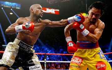 Floyd Mayweather Jr. throws a left at Manny Pacquiao