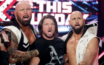 Luke Gallows, A.J. Styles and Karl Anderson, collectively know as The Club, show their reactions to Roman Reigns in an episode of Monday Night Raw.