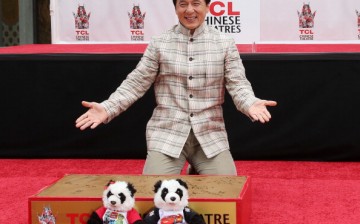 Actor Jackie Chan poses during the Jackie Chan Hand and Foot Print Ceremony at the TCL Chinese Theatre on June 6, 2013 in Hollywood, California.