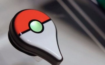 The Pokemon GO Plus companion device is displayed 