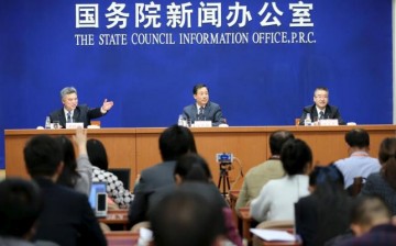 Officials from China National Space Administration answer queries during a press conference in Beijing in April.