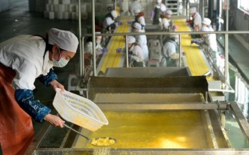 A worker at a food processing factory in Yichang, Hubei Province.