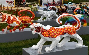Tiger sculptures made by students and teachers from Yunnan Nationalities University.