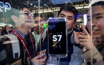 Visitors look at the new Samsung Galaxy S7 on the opening day of the World Mobile Congress at the Fira Gran Via Complex on Feb. 22, 2016 in Barcelona, Spain. 