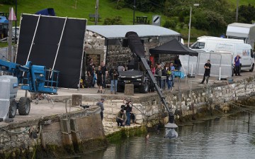 Maisie Williams, who plays Ayra Stark on “Game of Thrones,” is filmed during a water scene for the new series on Aug. 17, 2015 in Carnlough, Northern Ireland. 