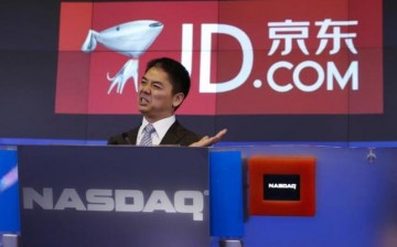JD.com CEO and founder Richard Liu speaks at the NASDAQ Market site at Times Square in New York.