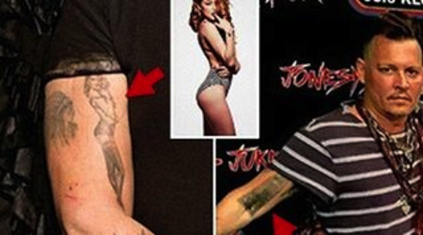 Johnny Depp's Amber Heard tattoo on his right bicep
