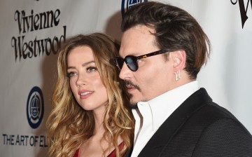Actors Amber Heard (L) and Johnny Depp attend The Art of Elysium 2016 HEAVEN Gala presented by Vivienne Westwood & Andreas Kronthaler at 3LABS on January 9, 2016 in Culver City, California.