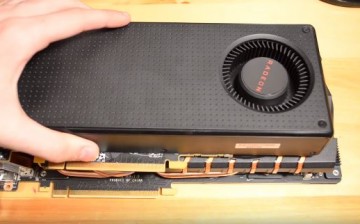 The AMD Radeon RX 480, packed with numerous new features and has the latest technology is placed on top of another graphics card.