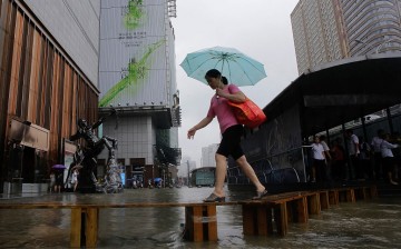 Flood sweeps Wuhan due to torrential rains brought by the monsoon.
