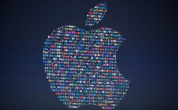 The Apple logo is projected on the screen at an Apple event at the Worldwide Developer's Conference on June 13, 2016 in San Francisco, California. 
