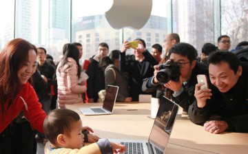 Customers experience Apple products as Nanjing opens second Apple Store on Jan. 16, 2016 in Nanjing, Jiangsu Province of China. 