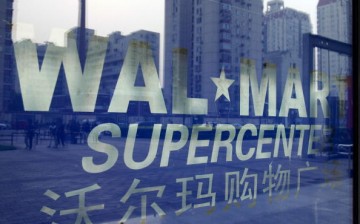 Wal-Mart China introduces a new work hour scheduling system.