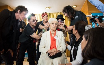 Hollywood Vampires' Joe Perry, Johnny Depp and Alice Cooper help a patient of the Starkey HEaring Foundation at Four Season Hotel Ritz Lisbon on May 27, 2016 in Lisbon, Portugal. 