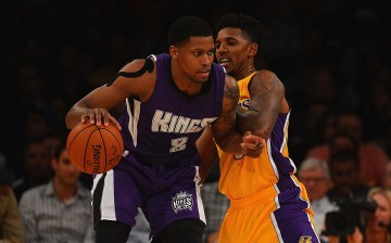 Sacramento Kings small forward Rudy Gay posts up against Los Angeles Lakers' Nick Young.