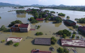 Aerial view of houses being flooded in Dongyun Village of Liqiao Town on July 7, 2016 in Xuancheng, Anhui Province of China. 
