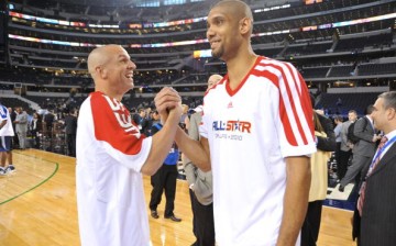 Jason Kidd and Tim Duncan shake hands before the 2010 NBA All-Star Game.