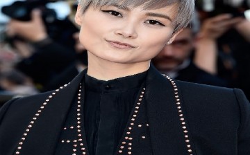 Li Yuchun aka Chris Lee attends the 'From The Land Of The Moon (Mal De Pierres)' premiere during the 69th annual Cannes Film Festival at the Palais des Festivals on May 15, 2016 in Cannes, France. 