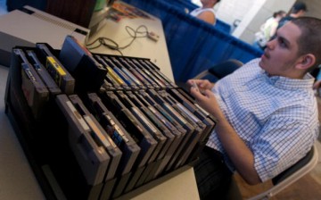 David Moreno of San Diego, California plays on an orignial Nintendo Entertainment System at the launch party for the International Video Game Hall of Fame and Museum