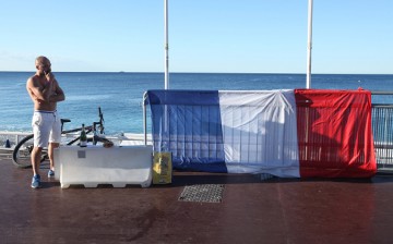 The French flag is prominently displayed along the Promenade des Anglais, the scene of a terrorist attack that killed at least 84.