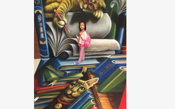 A girl poses for photo with a 3D painting in a shopping mall in Taipei, Taiwan, July 17, 2016. Over ten pieces of 3D paintings were presented in the mall.