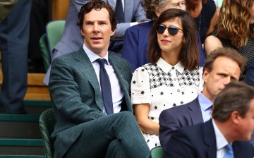 Benedict Cumberbatch and Sophie Hunter look on prior to the Men's Singles Final match between Andy Murray of Great Britain and Milos Raonic of Canada on day thirteen of the Wimbledon Lawn Tennis Championships at the All England Lawn Tennis and Croquet Clu