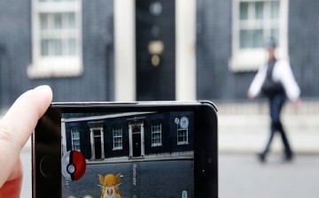 A Raticate, a character from Pokemon Go, a mobile game that has become a global phenomenon, on July 15, 2016, in Downing St , London, England. The app lets players roam using their phone's GPS location data and catch Pokemon to train and battle.The game h