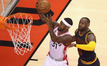 Terrence Ross #31 of the Toronto Raptors shoots the ball against LeBron James #23 of the Cleveland Cavaliers during the first half in game three of the Eastern Conference Finals during the 2016 NBA Playoffs at Air Canada Centre on May 21, 2016 in Toronto,