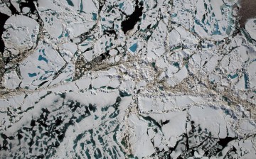 Chunks of sea ice, melt ponds and open water are all seen in this image captured at an altitude of 1,500 feet by the NASA's Digital Mapping System instrument during an Operation IceBridge flight over the Chukchi Sea on Saturday, July 16, 2016.