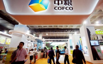 People visit the COFCO exhibition center during the 14th China Beijing International High-tech Expo (CHITEC) on May 18, 2011, in Beijing, China. 
