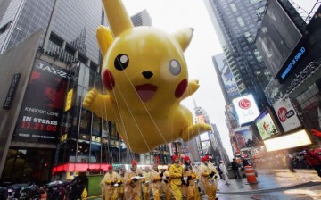 The Pikachu balloon makes its way down a rainy Broadway during the 80th Macy's Thanksgiving Day parade, November 23, 2006 in New York City. 