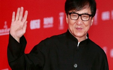 Jackie Chan poses for a picture on the red carpet at The 18th Shanghai International Film Festival on June 13, 2015 in Shanghai, China. 