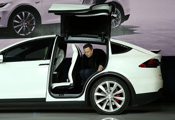 FREMONT, CA - SEPTEMBER 29: Tesla CEO Elon Musk steps out of the new Tesla Model X during an event to launch the company's new crossover SUV on September 29, 2015 in Fremont, California. After several production delays, Elon Musk officially launched the much anticipated Tesla Model X Crossover SUV. The (Photo by Justin Sullivan/Getty Images) 