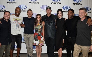 (L-R) Writer/executive producer Hank Steinberg, actors LaMonica Garrett, Travis Van Winkle, Marissa Neitling, Adam Baldwin, Bridget Regan, Jocko Sims and writer/executive producer Steven Kane attend 'The Last Ship' panel, TNT at Wondercon 2016 at Los Ange